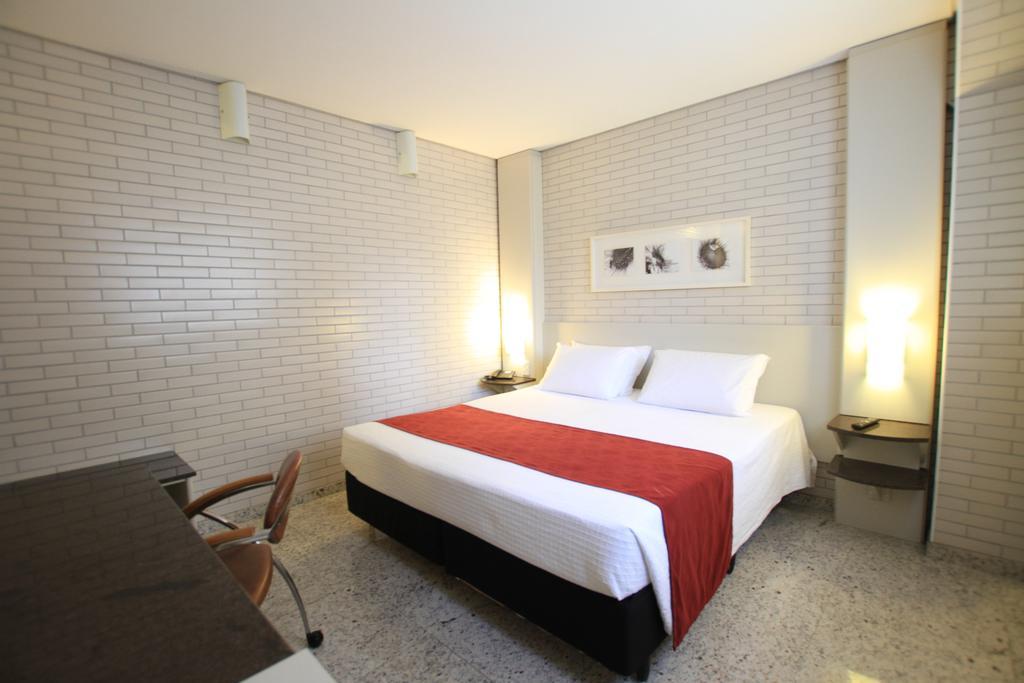 Hotel Confiance Batel Куритиба Номер фото