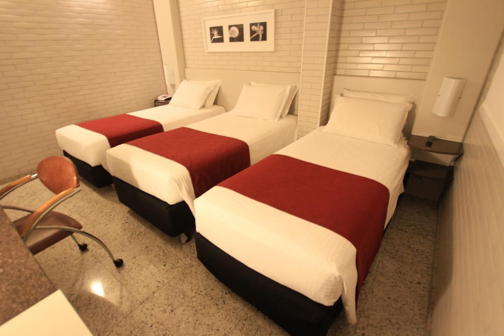 Hotel Confiance Batel Куритиба Номер фото